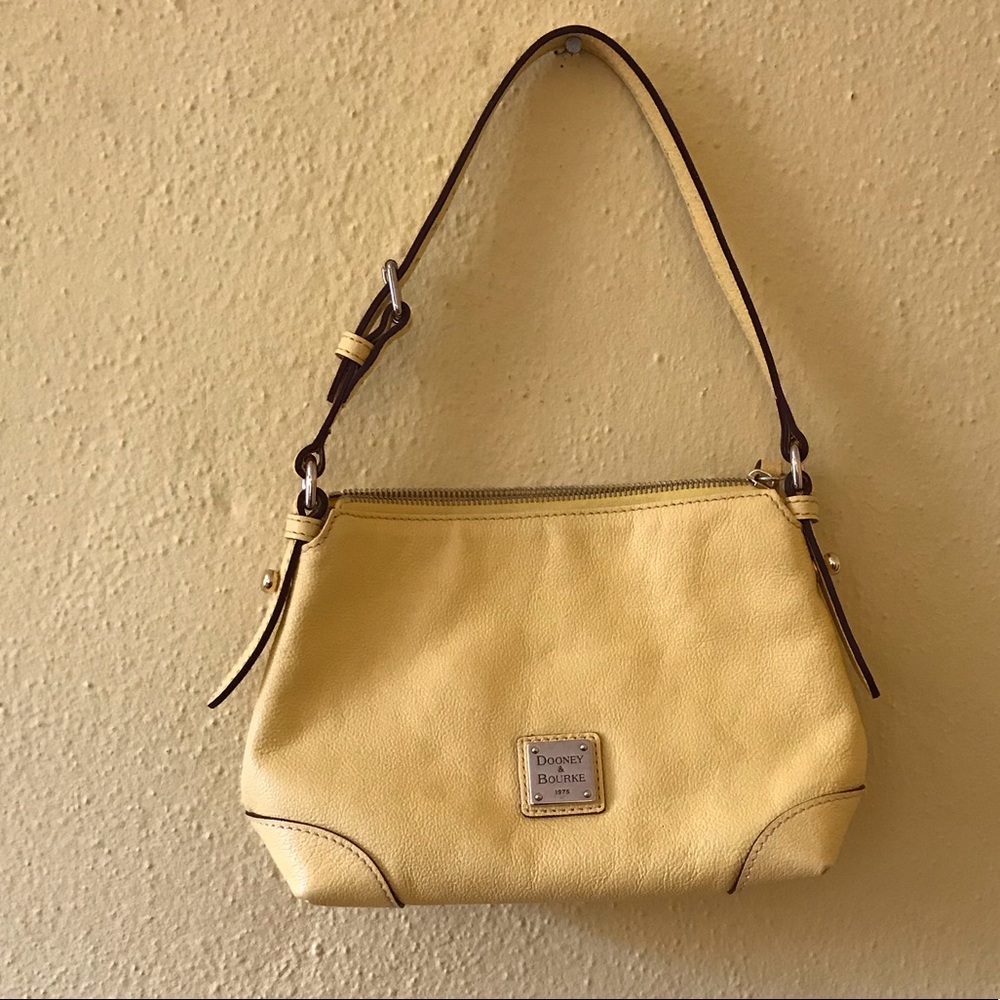 Mini yellow dooney and Bourke purse